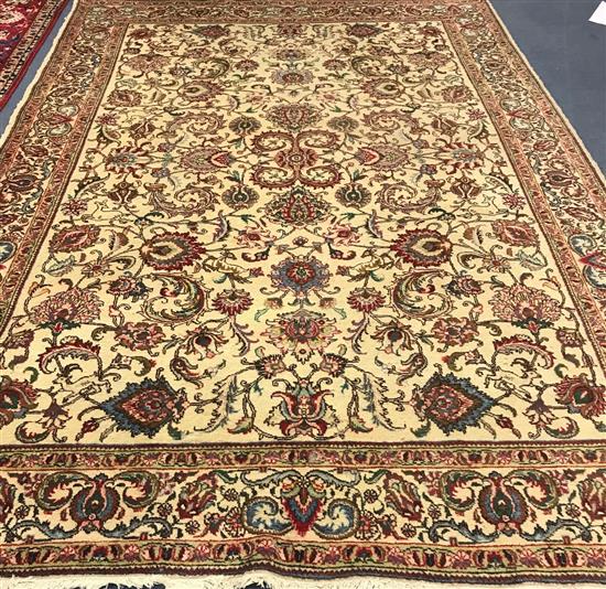 A cream ground Tabriz carpet 335 x 235cm
